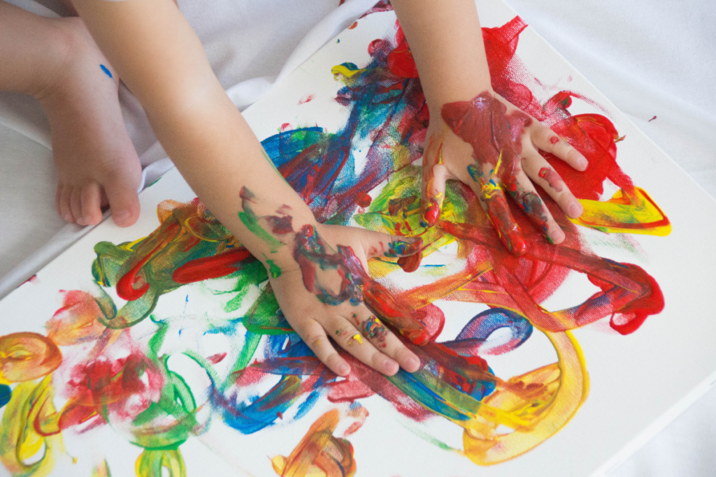 child hand painting